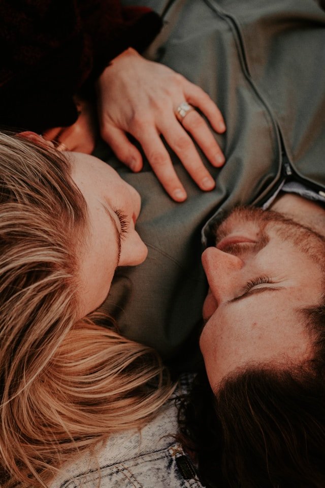Woman looking into her partner's eyes with emotional intensity, reflecting deep love and connection