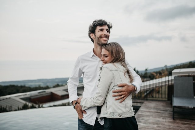 A couple embracing closely, representing the fragile trust and reconnection that couples pursue in infidelity trauma recovery